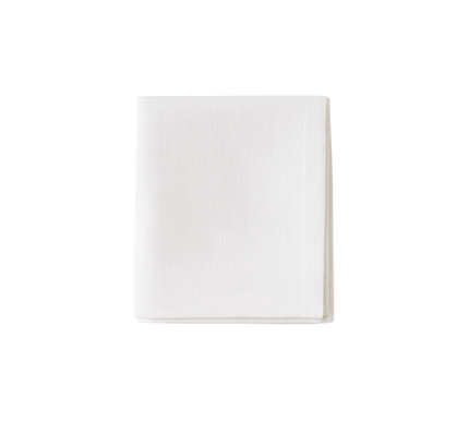 Toalha de mesa em linho, cor branco-sujo.